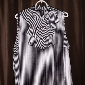 Black and white sleeveless sheer blouse